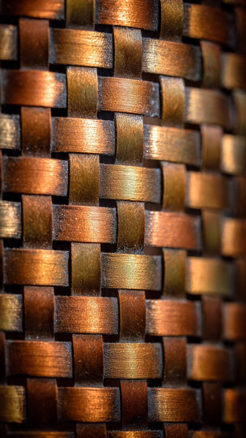 Artistic woven metal wall tapestry with mixed metals