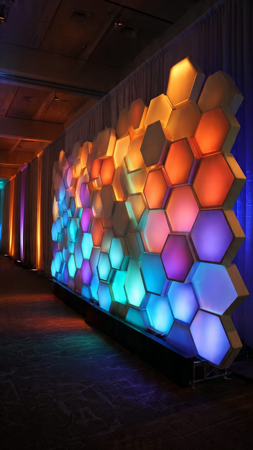 Floor-to-ceiling artistic LED light installation in modern living room